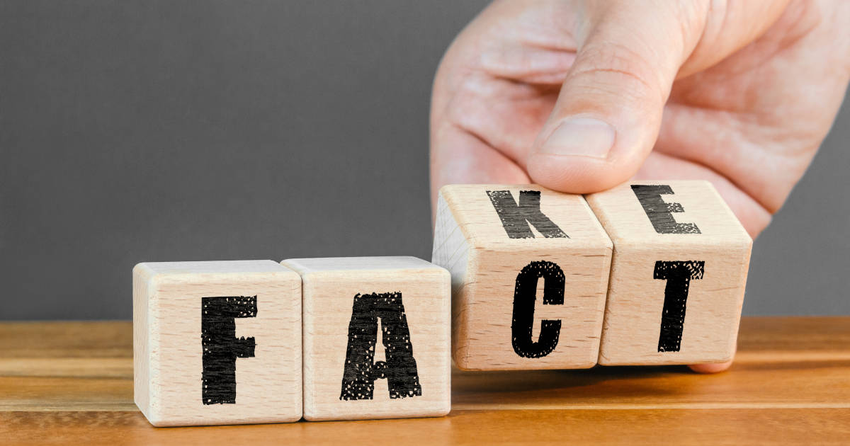 fact or fake printed on wood blocks